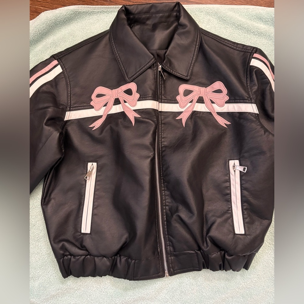 Chic Black Jacket with Pink Bow Details